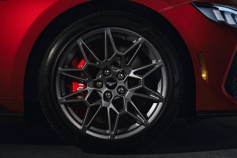 2024 Ford Mustang® model with a close-up of a wheel and brake caliper | Capital City Ford in Pierre SD